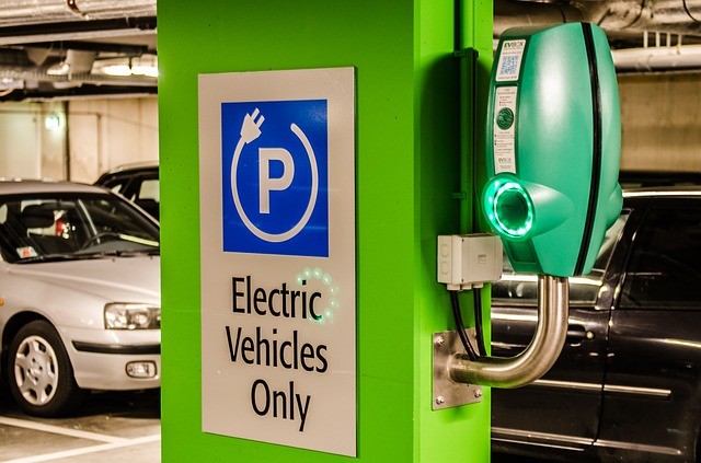Electric Vehicles Only sign at a charging station